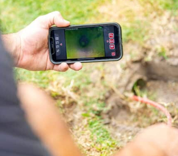 Underground Plumbing Pipe Inspection Service Refined Plumbing Sunshine Coast inspecting underground pipe with camera